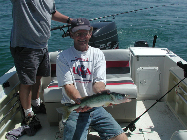 Dan with a nice 4.5# 22" walleye, caught off of Middle Sister Island 8/1/04