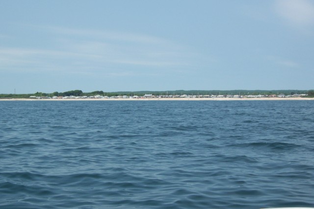 If you zoom in you will see all these shacks are literally on the beach.