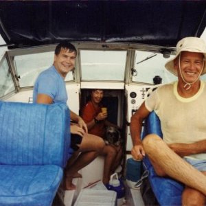 This picture is from the early 90's - waiting out a storm.  Between the seats has a well area and storage under the bow.  New seats were installed in 