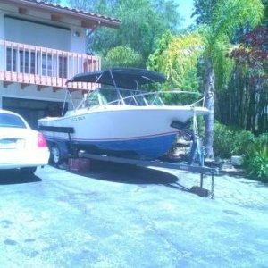 Boat front view with Bimini top up