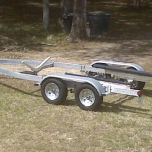 trailer, prior to painting and installing new winch, wiring, lights, guide ons, bunk stiffer, bunks and carpet.