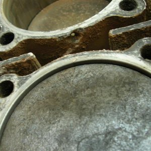 Hole in #1 Piston from corrosion.   