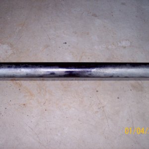 Axle sprayed with Rust Converter