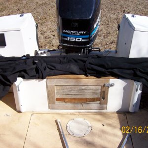 A view of the transom area.  Black canvass is the Bimini Top.