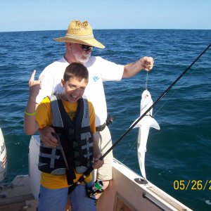 Pawpaw and Joey with a sand shark.