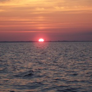 Sunrise at 5:20 AM looking back at Point Judith RI heading out to Misquamicut.