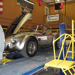 The Employee, Flogging The Boss's Cobra On the Dyno. 
330hp/360lb.ft.
Dual Quads But the cam is mild and the fours are 360 CFM - A Daily Driver
