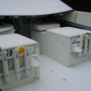 Two boxes hold rod-holders, swivel seats and 40 gal fuel each...