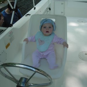 Here is Lana Rose at the helm of the "Lana Rose". That's right, I named the boat after my daughter.