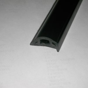 A section of the new rail. Semi rigid vinyl and rubber insert.