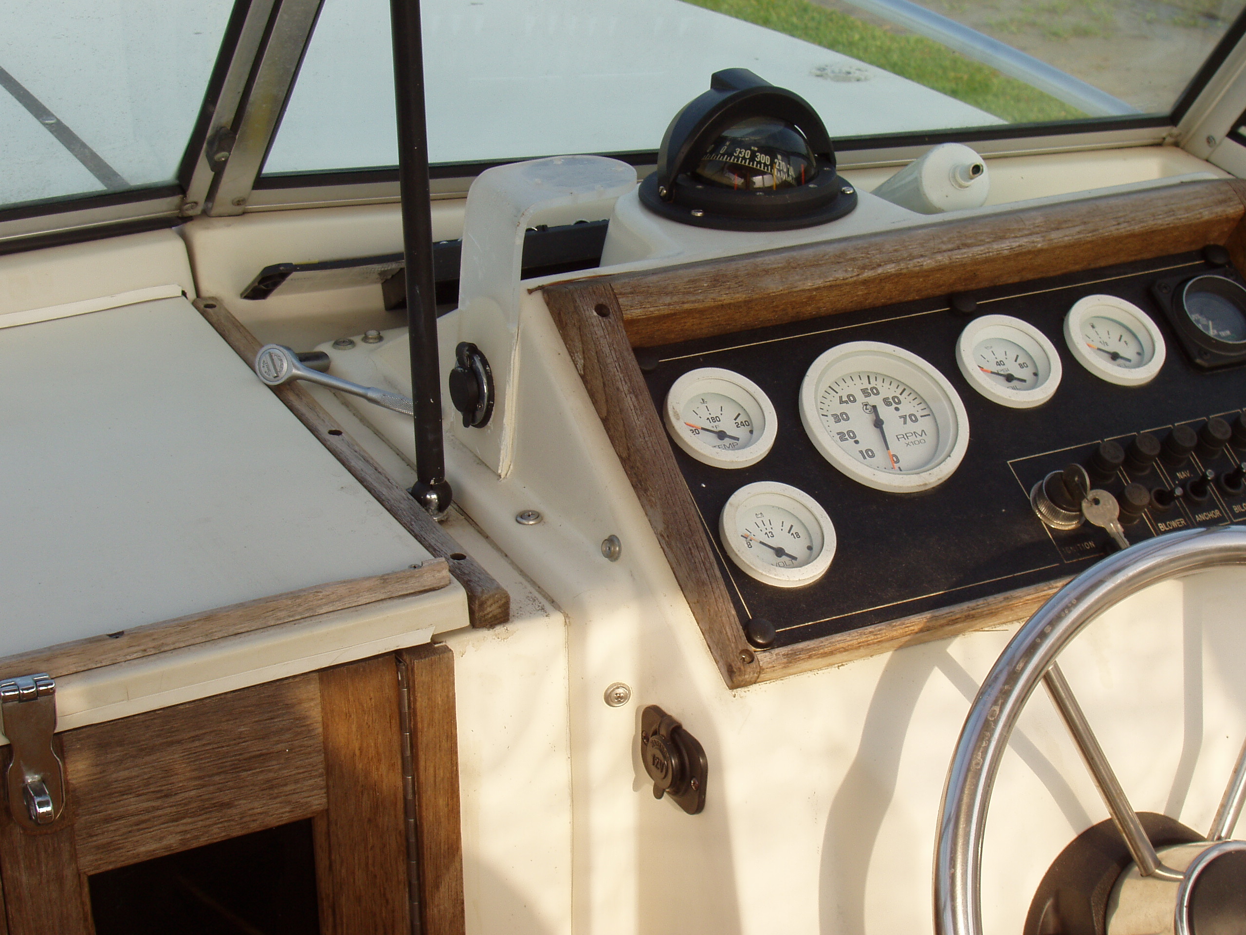 Auxilary power outlets, the lexan bracket mounted a gps, going to redo the dash with Starboard and flush mount the electronics