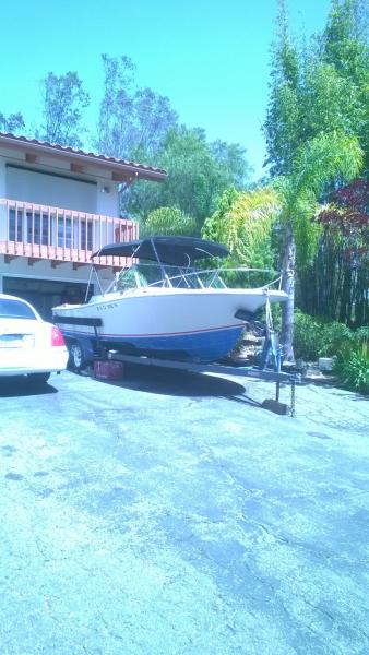 Boat front view with Bimini top up