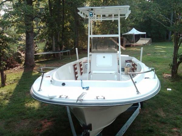 Bow shot I have a 70lb minnkota co pilot I put on the front that is why the bow rail is cut in the middle. And it also makes it easy to climb over the