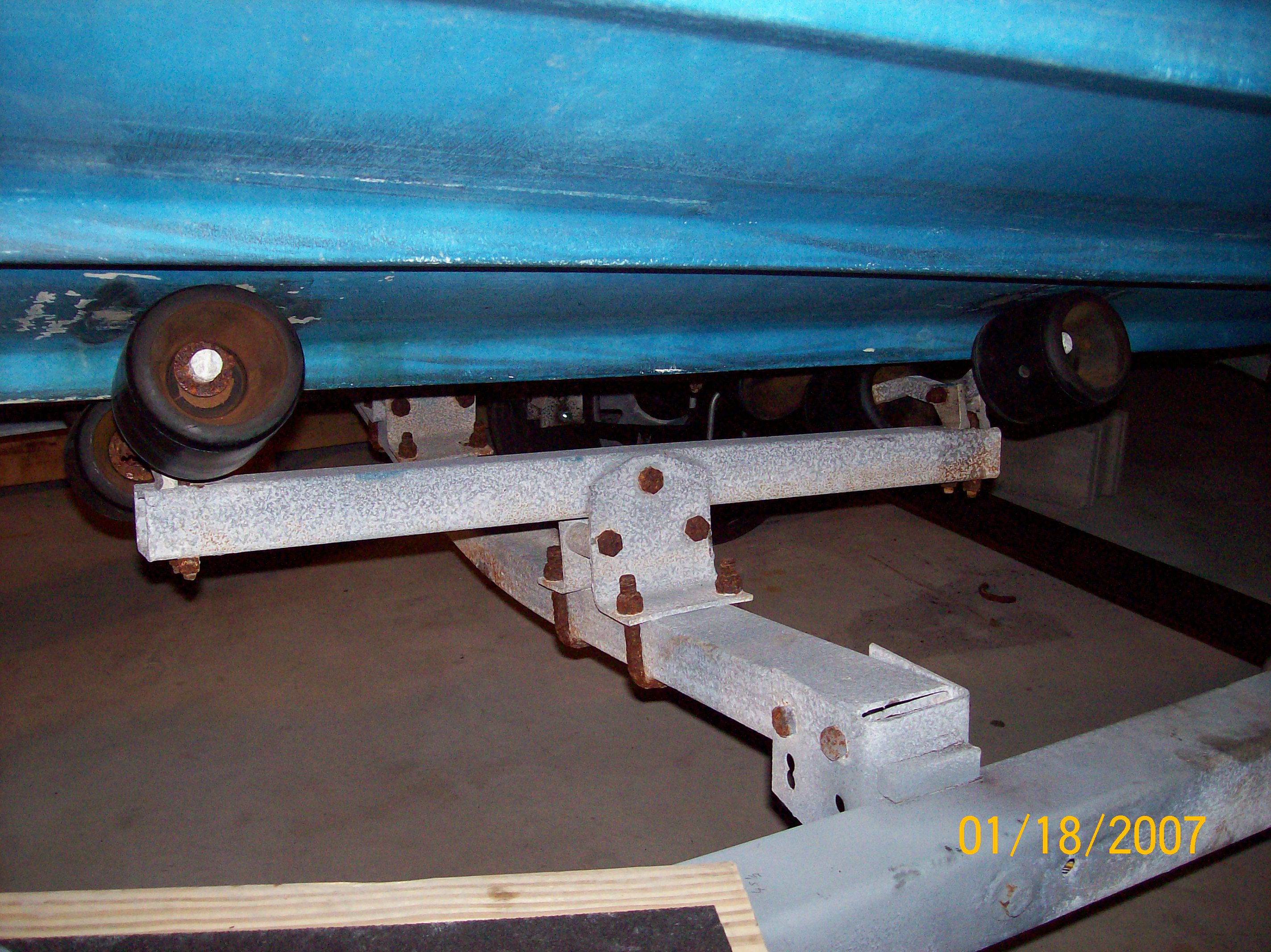 Front port side roller arm support.