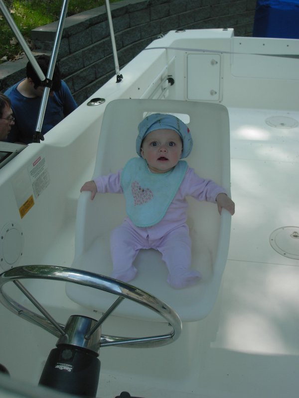 Here is Lana Rose at the helm of the "Lana Rose". That's right, I named the boat after my daughter.