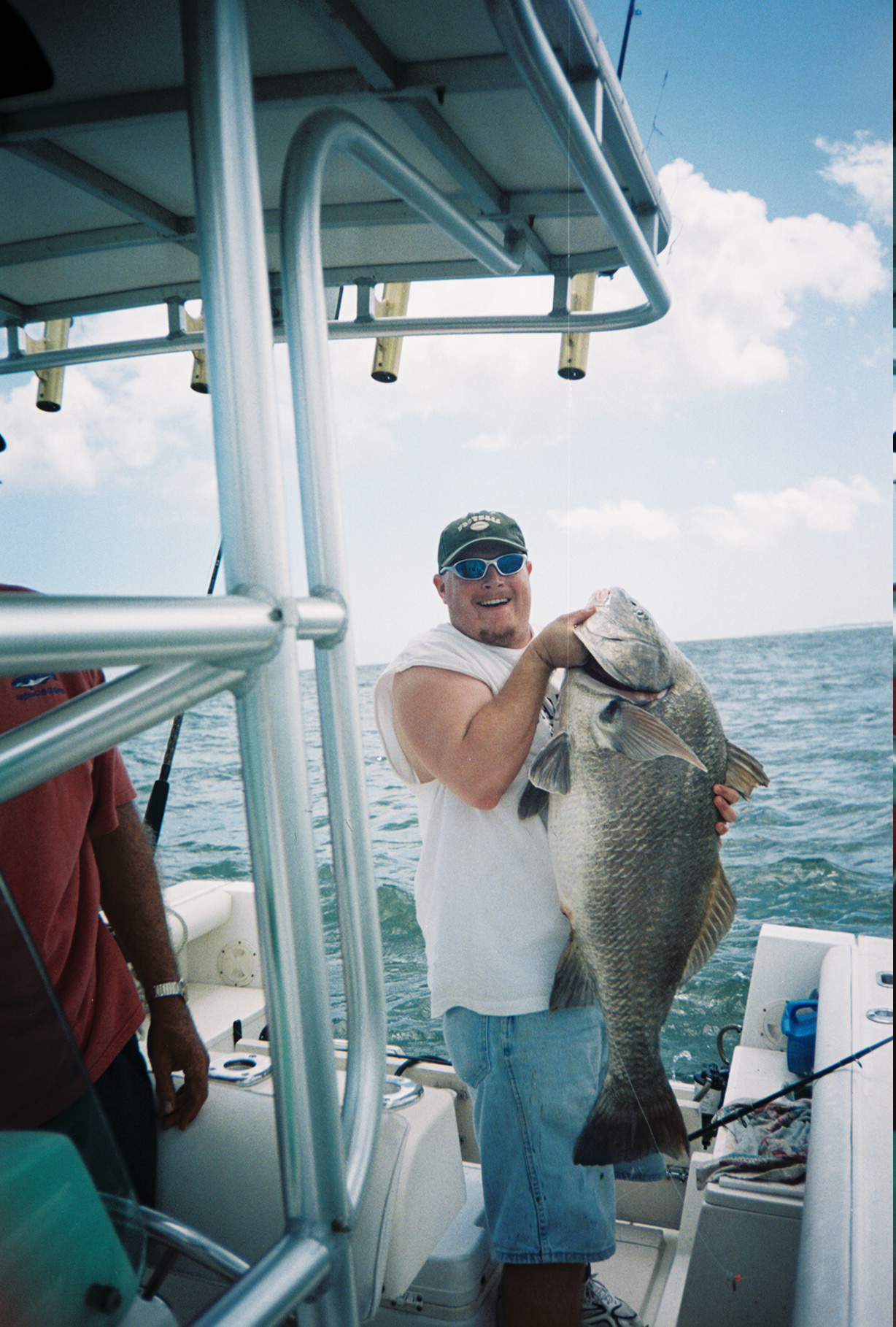 My son with a baby Black Drum