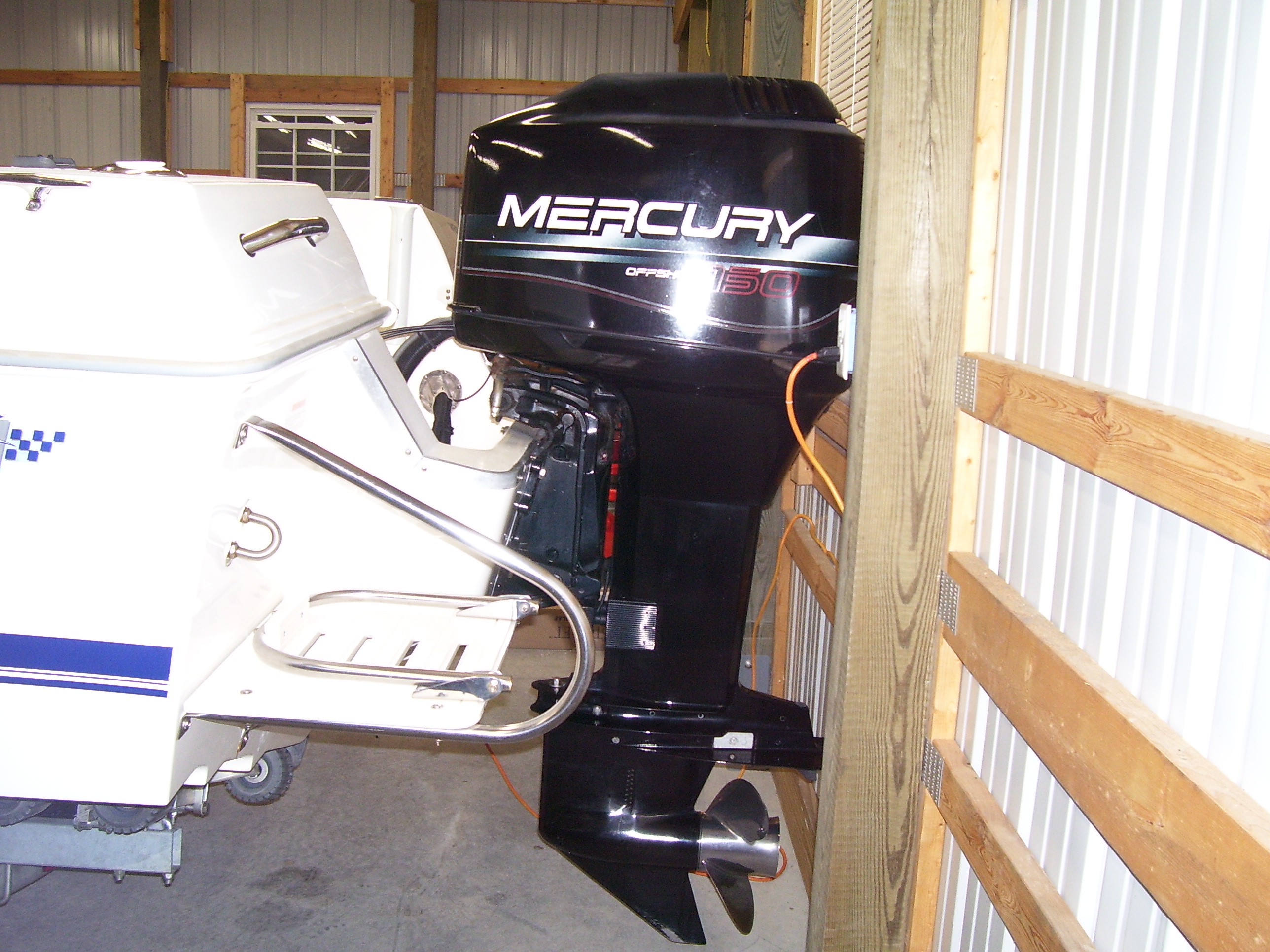 Original 150 Mercury Offshore with less than 200 hours. Skeg still has original paint on it!..... 