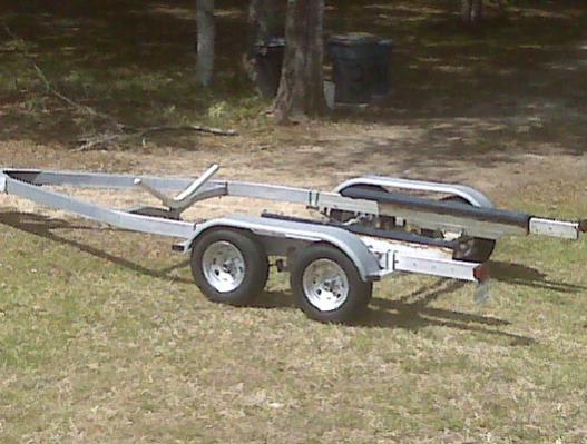 trailer, prior to painting and installing new winch, wiring, lights, guide ons, bunk stiffer, bunks and carpet.